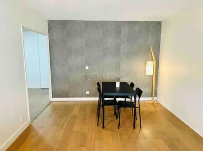 Coin salon dans l'établissement Appartement lumineux et spacieux proche gare