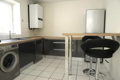 Cuisine ou kitchenette dans l'établissement A la Suite du Jardin de l'Isle