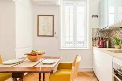 Cuisine ou kitchenette dans l'établissement Nid de calme centrale climatisé