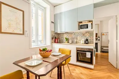Cuisine ou kitchenette dans l'établissement Nid de calme centrale climatisé