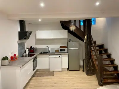 Cuisine ou kitchenette dans l'établissement Maison au coeur de la Dombes