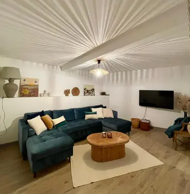 Coin salon dans l'établissement Maison au coeur de la Dombes