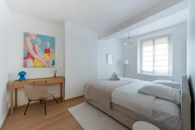 Un ou plusieurs lits dans un hébergement de l'établissement Alma - Charmant apt 2 chambres