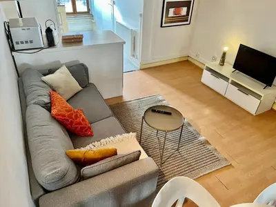 Télévision ou salle de divertissement dans l'établissement Suite Jason Appartement 4 personnes - Check in h24 & Wifi