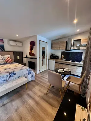 Un ou plusieurs lits dans un hébergement de l'établissement Chalet cosy et coconing