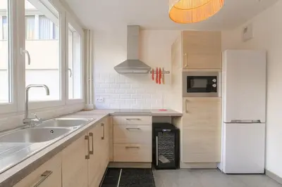 Cuisine ou kitchenette dans l'établissement Élégant et Spacieux idéal déplacement Pro