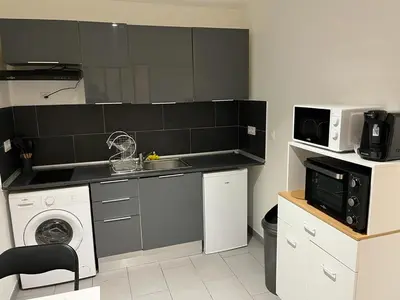 Cuisine ou kitchenette dans l'établissement Jolie perle