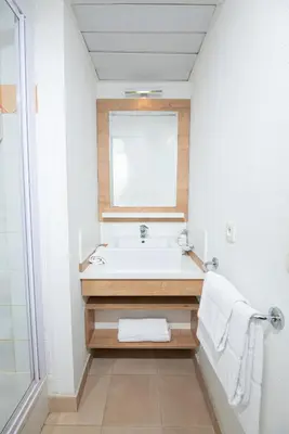 Salle de bains dans l'établissement Apparthotel Privilodges Lyon Lumière