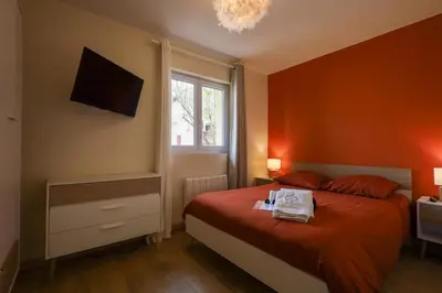 Un ou plusieurs lits dans un hébergement de l'établissement Appartement le cocon de terre