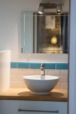 Salle de bains dans l'établissement Le petit Imbert - studio chaleureux et cozy