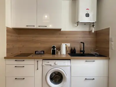 Cuisine ou kitchenette dans l'établissement Le Pacha, BNBConciergerie