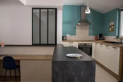 Cuisine ou kitchenette dans l'établissement Gîte - Quartier ancien