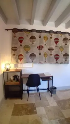 Coin salon dans l'établissement Chambres d'hôtes des Cigognes