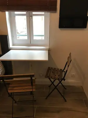 Télévision ou salle de divertissement dans l'établissement Cozy Studio for 2 People Blandan Sathonay Terreaux