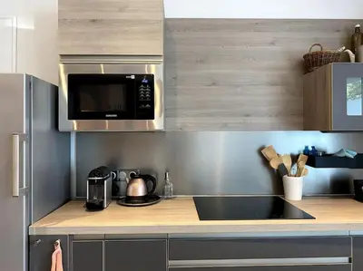 Cuisine ou kitchenette dans l'établissement Le nuage des balmes