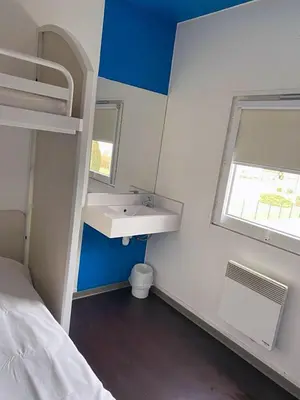 Un ou plusieurs lits dans un hébergement de l'établissement KRYSTAL HOTEL