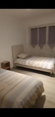 Un ou plusieurs lits dans un hébergement de l'établissement APPARTEMENT ARENA/ GROUPAMA STADIUM/ EUREXPO