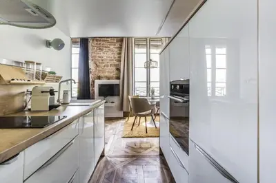 Cuisine ou kitchenette dans l'établissement Le petit Opéra