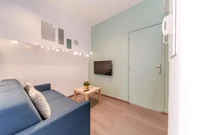 Télévision ou salle de divertissement dans l'établissement Le St Antoine cosy 4 pers Lafayette Part Dieu