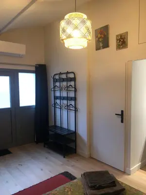 Un ou plusieurs lits dans un hébergement de l'établissement Chambre indépendante Charbonnières Les Bains