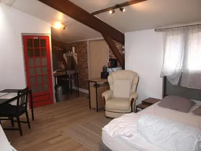 Un ou plusieurs lits dans un hébergement de l'établissement Studio Indépendant en Rez de jardin sans vis-à-vis