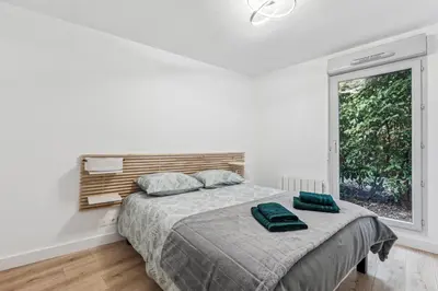 Un ou plusieurs lits dans un hébergement de l'établissement Comfort and tranquility near Lyon and Groupama Stadium, 4 personnes