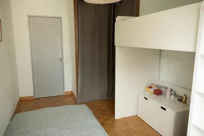 Un ou plusieurs lits dans un hébergement de l'établissement Appartement familial 2 chambres