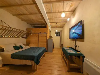 Un ou plusieurs lits dans un hébergement de l'établissement Logement - Studio indépendant à Pérouges