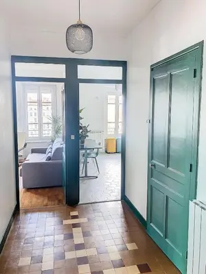 Un ou plusieurs lits dans un hébergement de l'établissement Spacieux T3 80m2 plein centre presque ile !