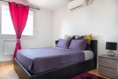 Un ou plusieurs lits dans un hébergement de l'établissement Appartement Fuychaa Proche de Lyon , Eurexpo , stadium , Aréna