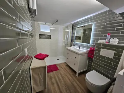 Salle de bains dans l'établissement Le duo
