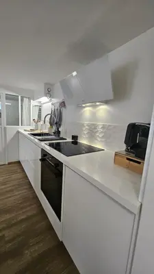 Cuisine ou kitchenette dans l'établissement Le duo