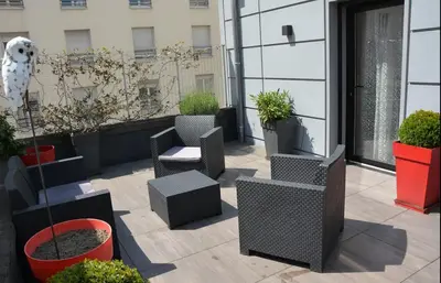 Coin salon dans l'établissement La Bonneterie Appartement de charme avec terrasse
