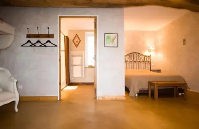Un ou plusieurs lits dans un hébergement de l'établissement B&B La Cerisaie