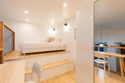 Un ou plusieurs lits dans un hébergement de l'établissement SmartStay Duplex - Centre-ville