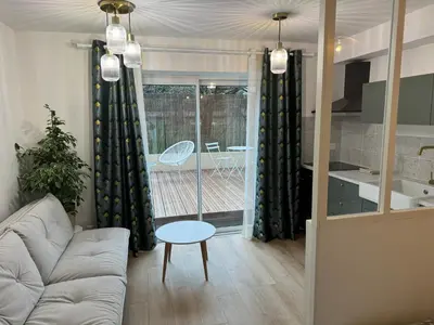 Coin salon dans l'établissement L'Écrin de Marie-Lou Studio Cosy
