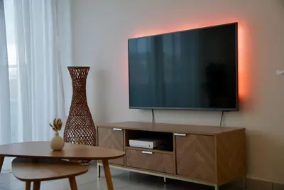 Télévision ou salle de divertissement dans l'établissement 