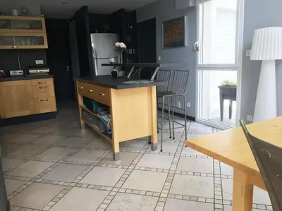 Cuisine ou kitchenette dans l'établissement villa Lyon Collonges au mont d'or: Piscine/Bocuse