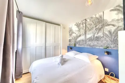 Un ou plusieurs lits dans un hébergement de l'établissement Le Verde - Ravissant appartement cosy