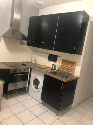 Cuisine ou kitchenette dans l'établissement « Le petit Bastille»Proche Lyon centre
