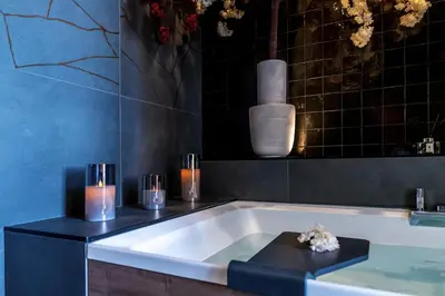 Salle de bains dans l'établissement HOST INN NEAT SUITE