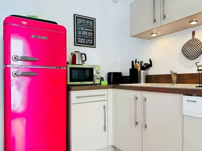Cuisine ou kitchenette dans l'établissement LOASIS -T4 Garage Clim Terrasse WIFI Centre-Ville