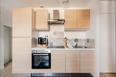 Cuisine ou kitchenette dans l'établissement La Jolie Bulle