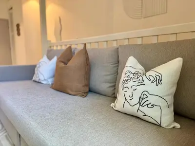 Coin salon dans l'établissement Suite Azure - Appartement 4 personnes - Check in h24 & Wifi