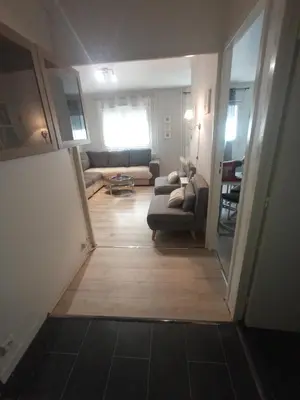 Un ou plusieurs lits dans un hébergement de l'établissement Studio cosy à 10 minutes du centre-ville.