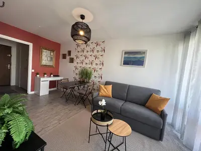 Coin salon dans l'établissement Les studios de Bron Pinel