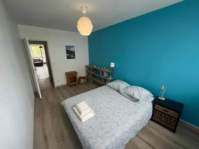 Un ou plusieurs lits dans un hébergement de l'établissement Appartement 6-8 personnes, accès direct à Lyon