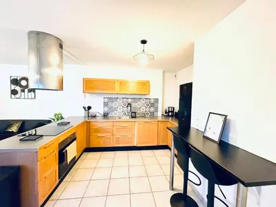 Cuisine ou kitchenette dans l'établissement *Le Golden Tropic* Magnifique T4 Terrasse+Parking