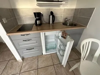 Cuisine ou kitchenette dans l'établissement CHARAVEL