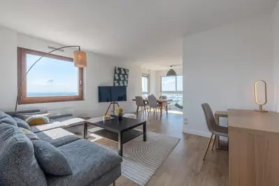 Coin salon dans l'établissement Appartement des Tourelles - Welkeys